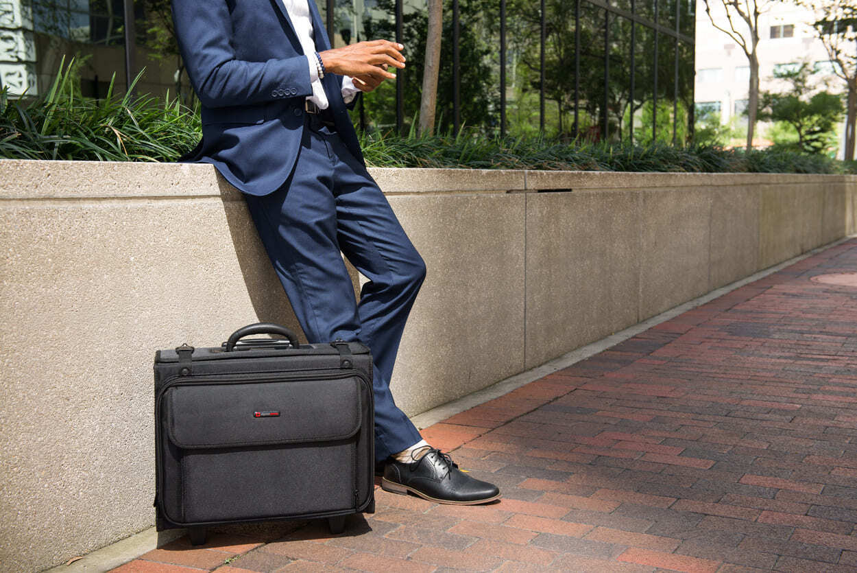 Man with suitcase preparing for long trip