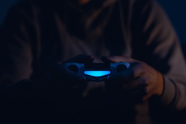 man playing video game man playing video game