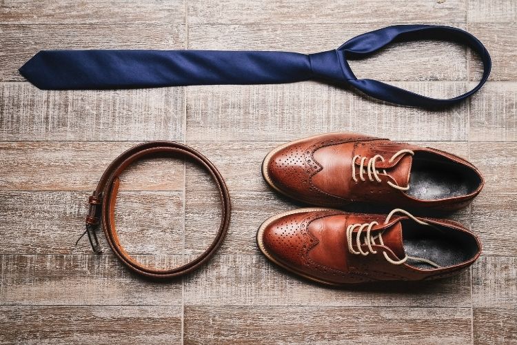 belt and shoes for a formal occasion