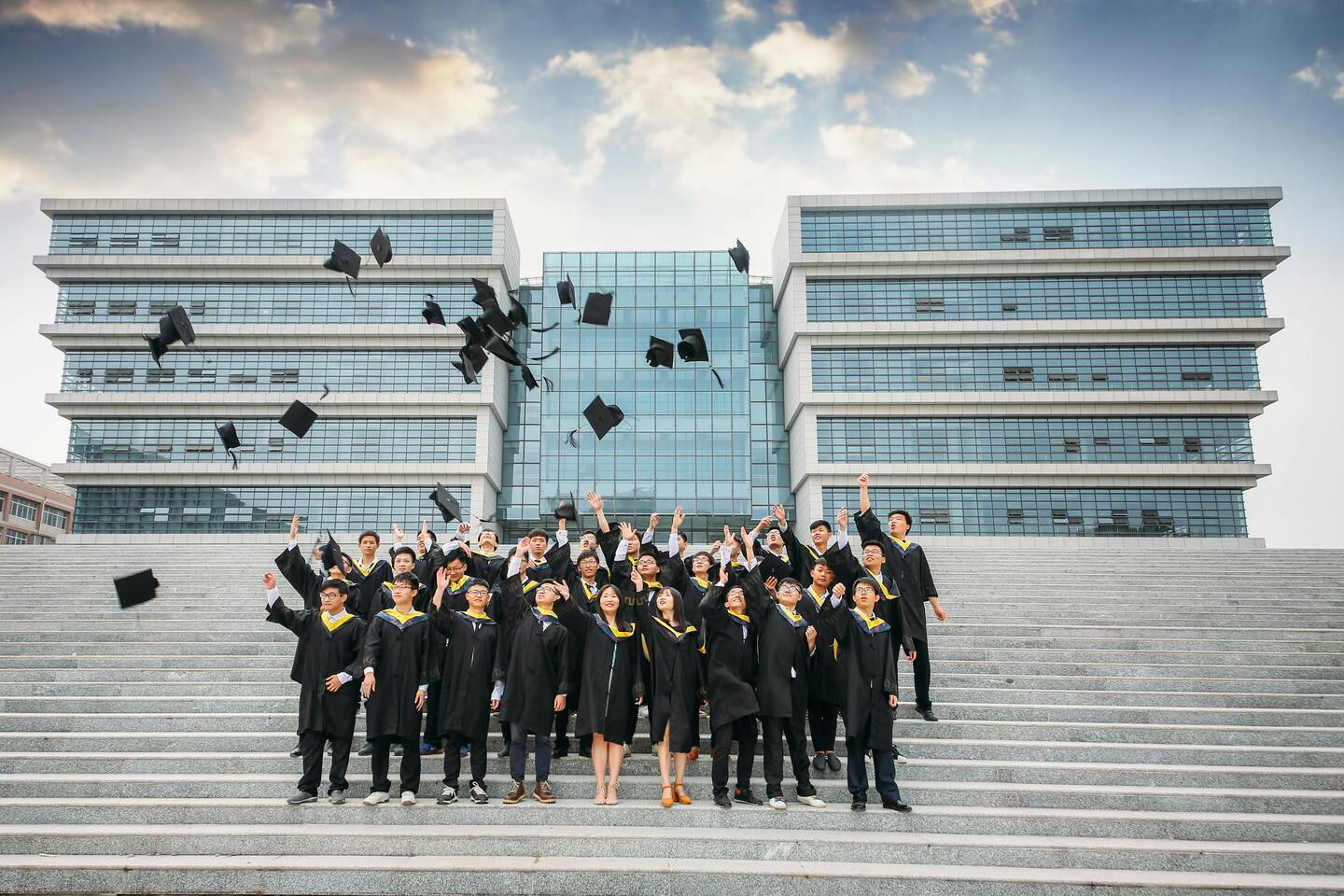 young people graduating from collage