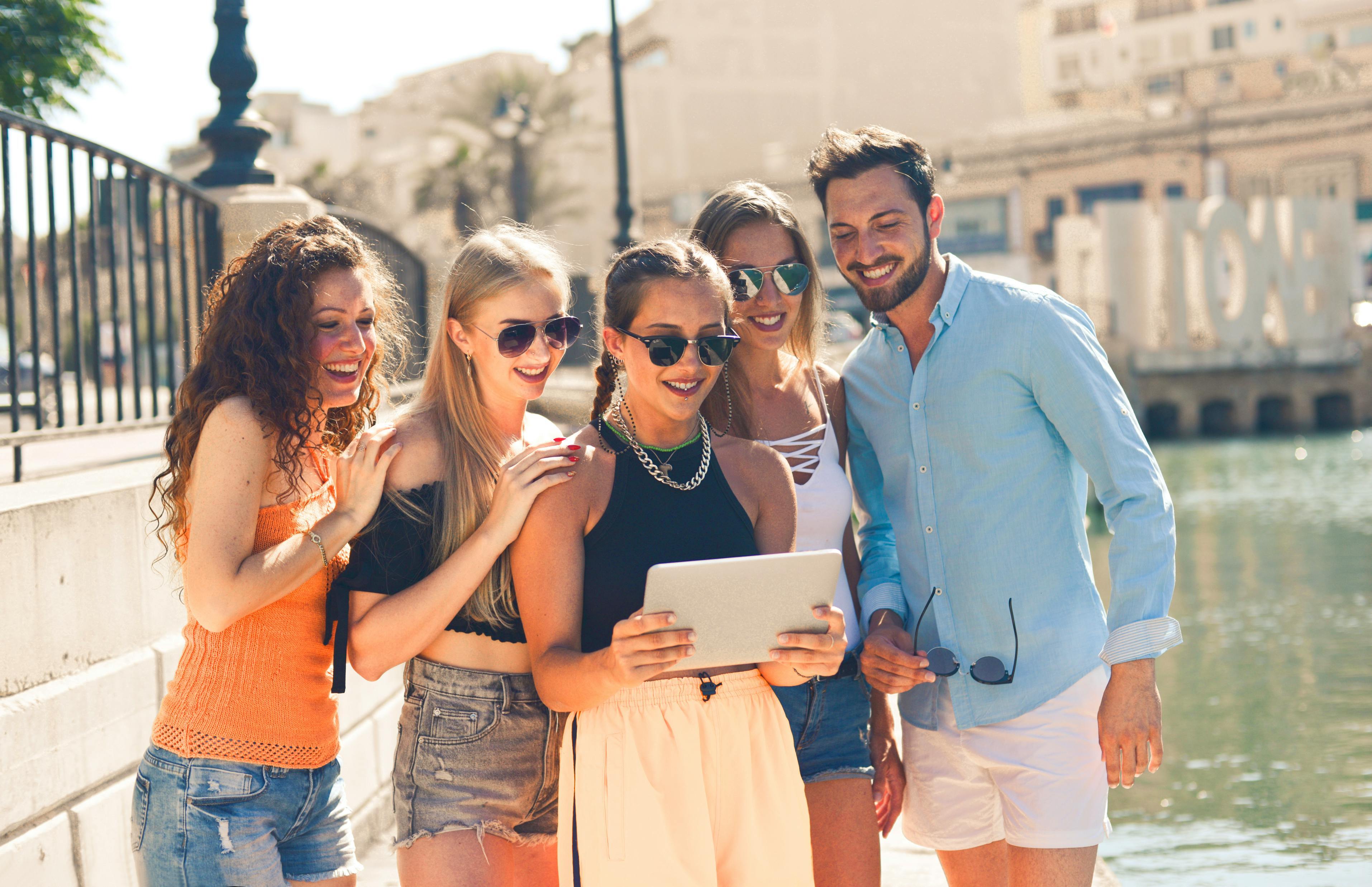 friends looking on a paper map