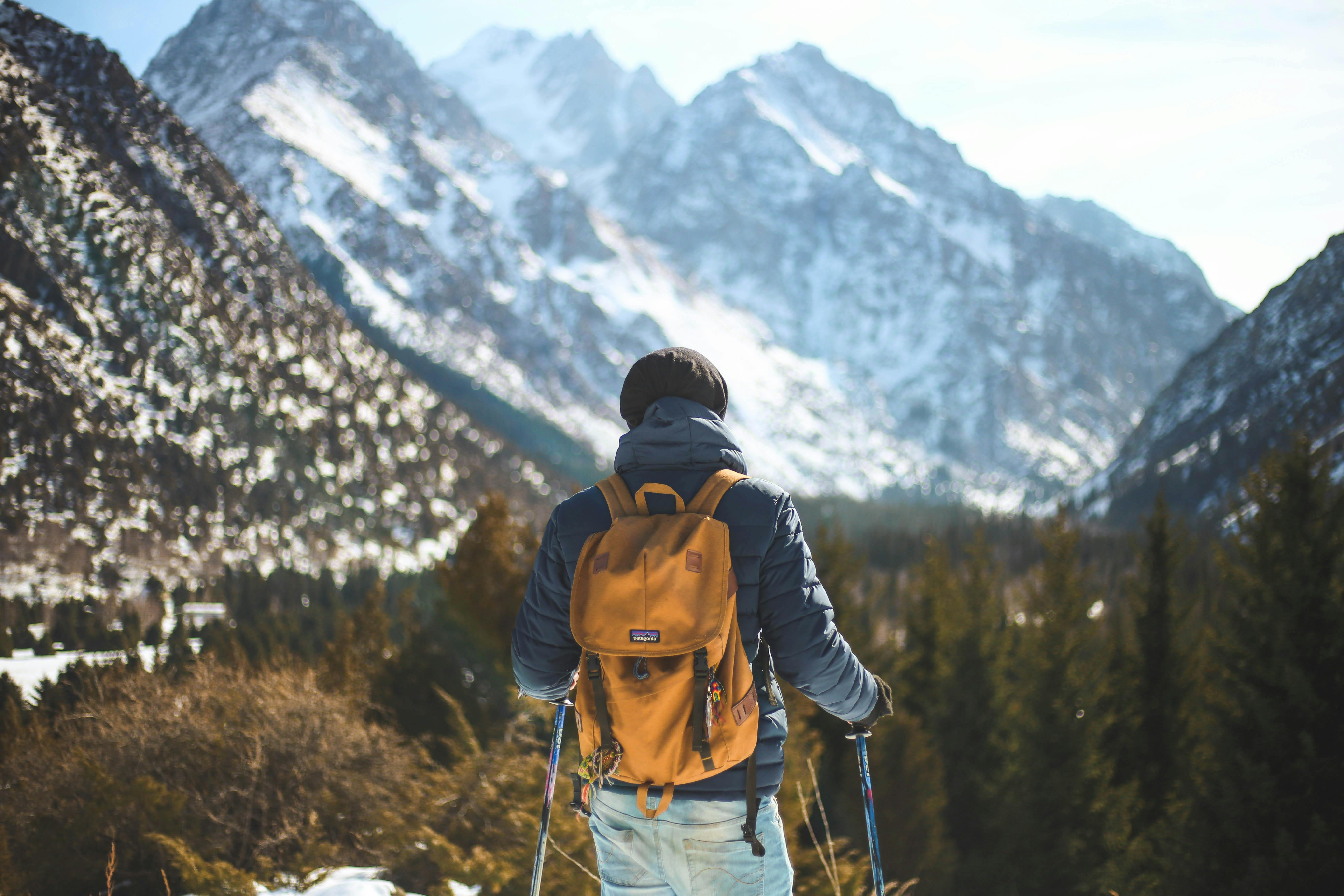 a man with a backpack going on a hike