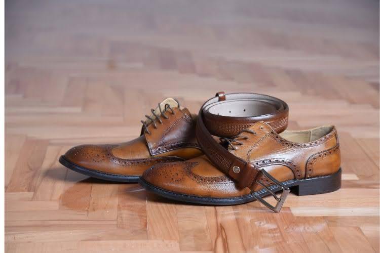 men's belt on men's shoes